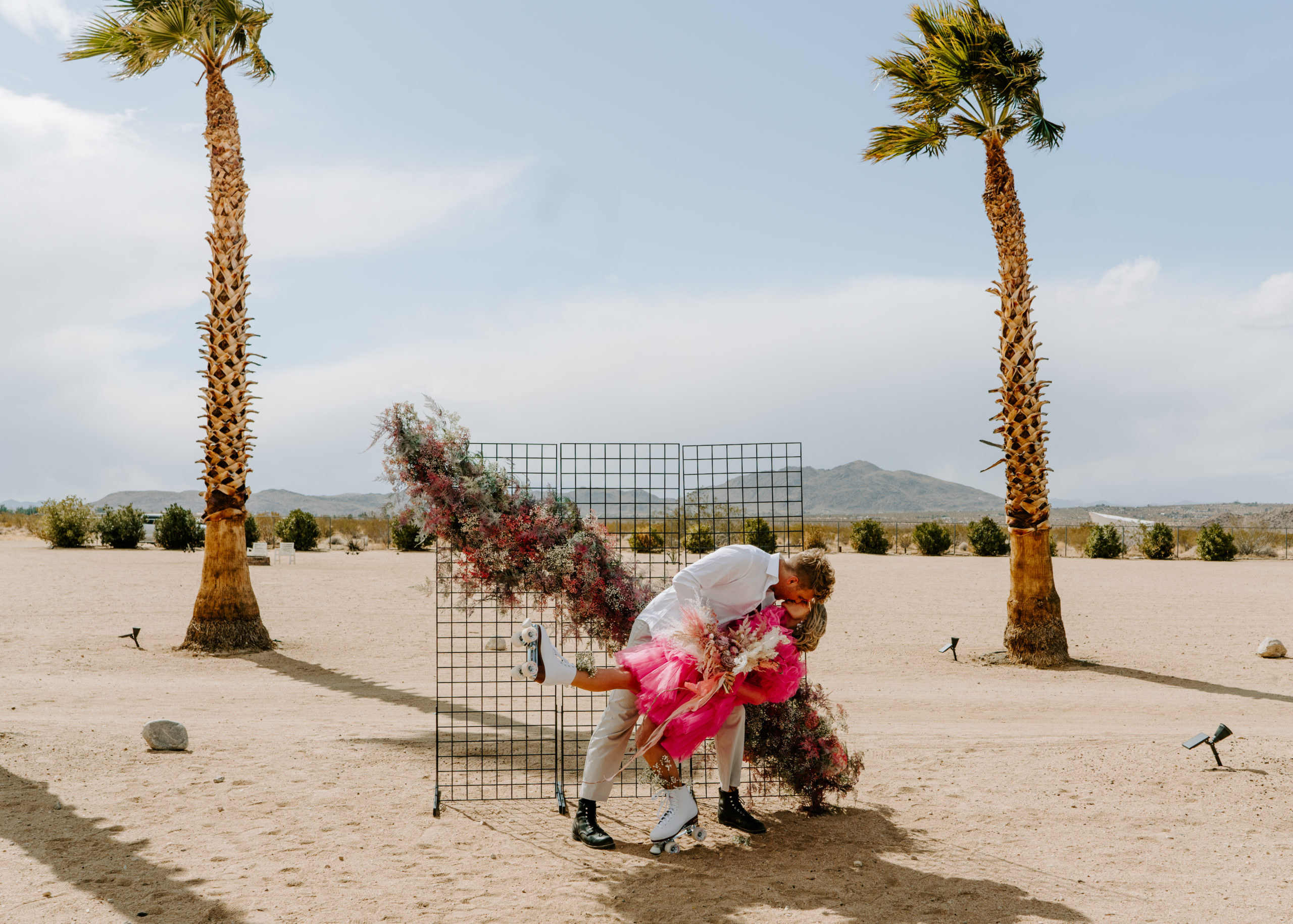 Pretty in pink couple engagement session shot by palm springs photogrpaher
