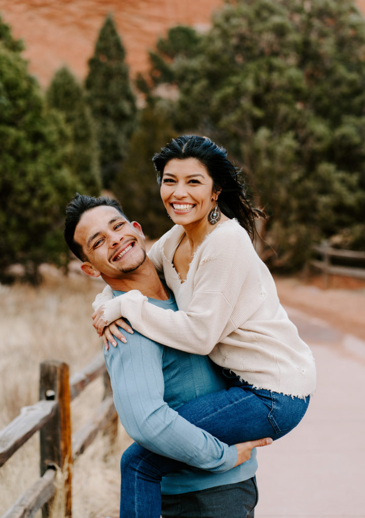Couple smiling looking at the camera in Colorado.