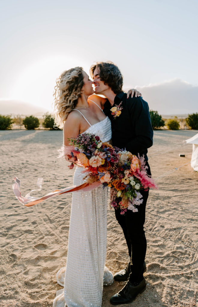 Bride and groom almost kissing after their Palm Springs wedding.
