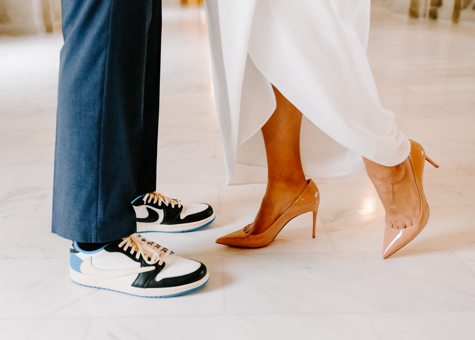 shoes of bride and groom in San Francisco wedding hall