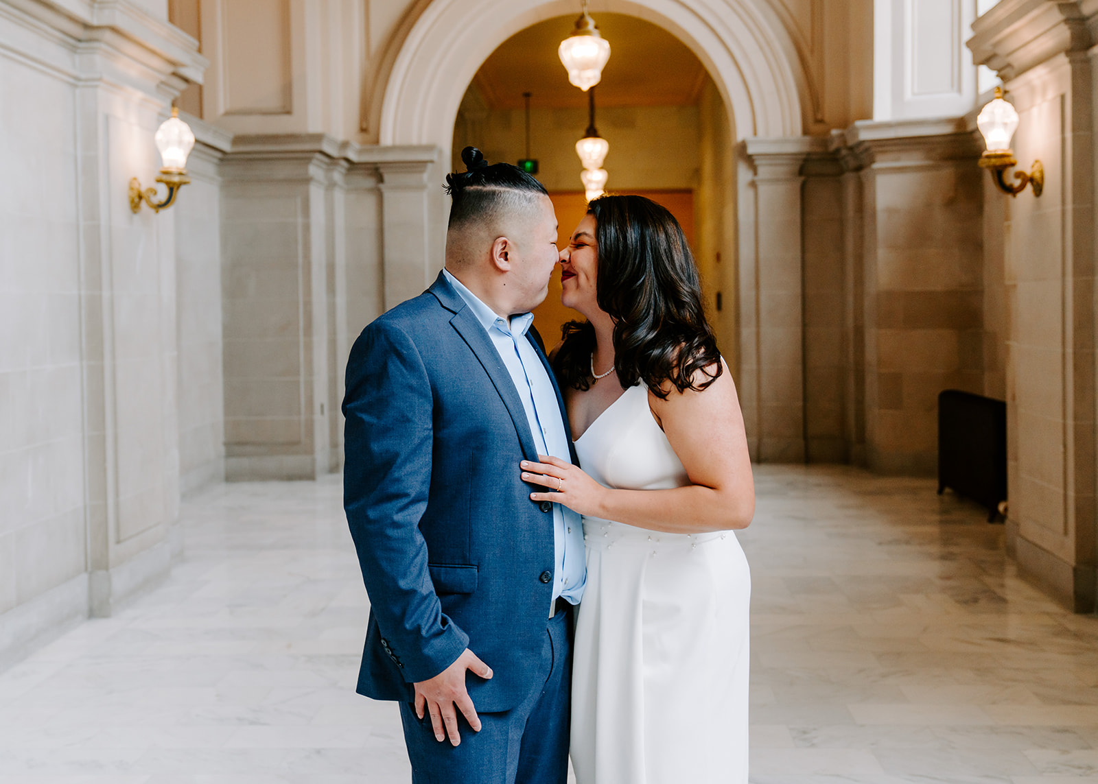 Bride and groom getting married in San Francisco City Hall