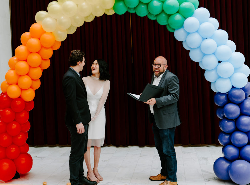 Couple eloping in San Francisco City Hall.