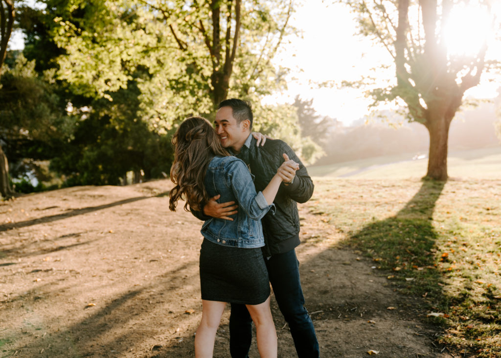 Couple dancing in the park.