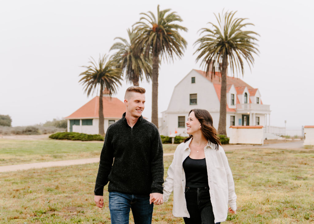 Couple looking at each other at Crissy Field.