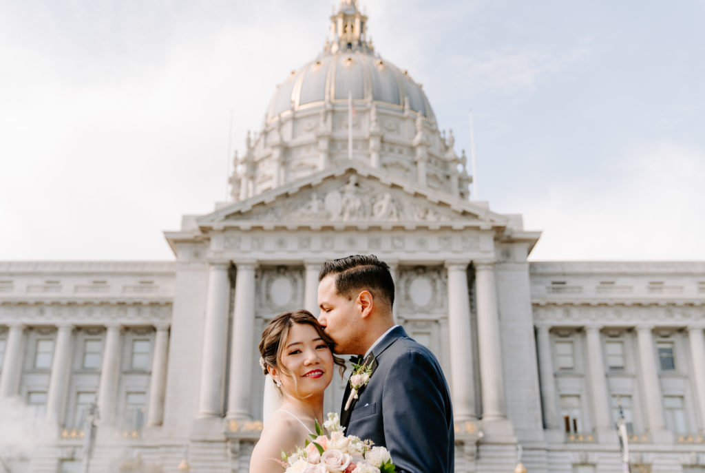 Couple getting married at SF City Hall.