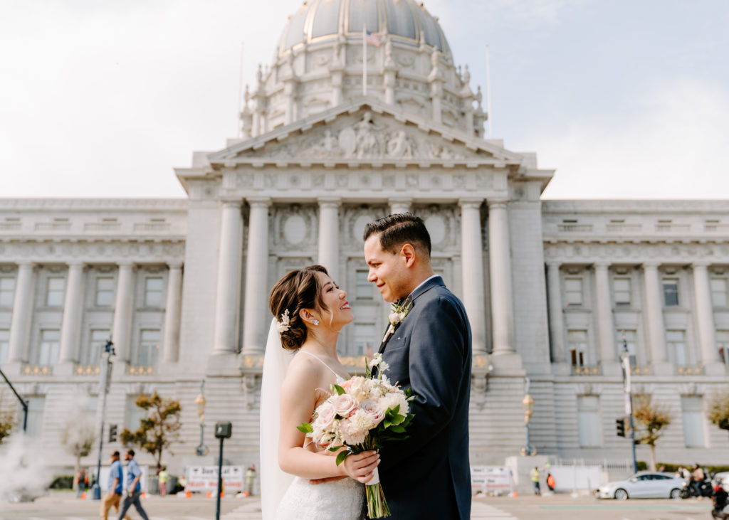 Couple eloping at SF City Hall.