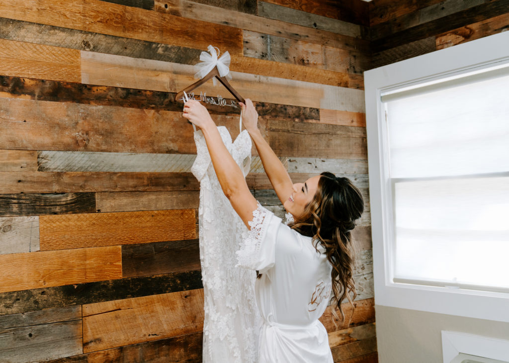 bride getting dress