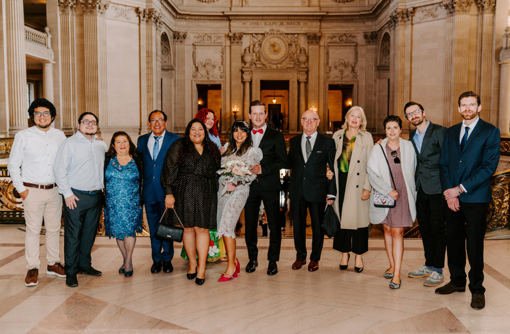 group photo after sf city hall elopement