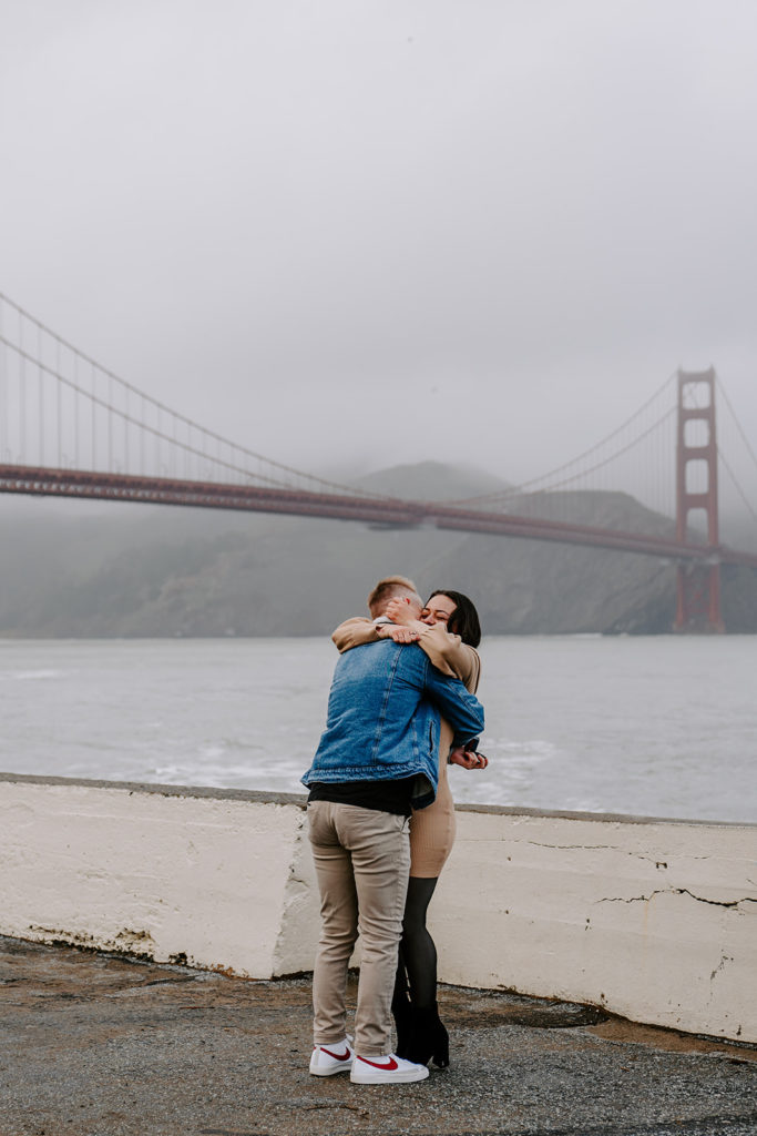 couple hugging at fort point