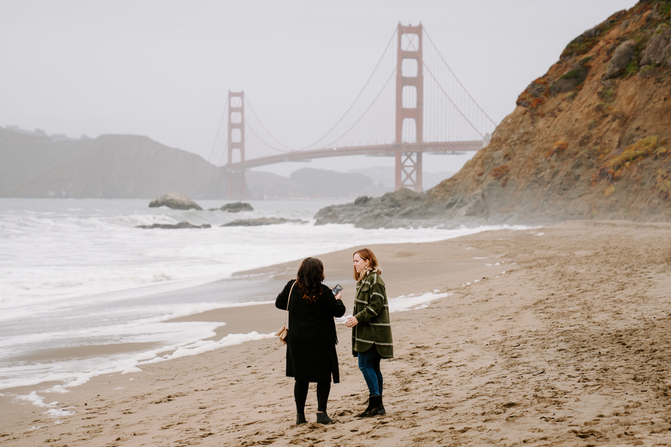 couple at baker beach in san francisco