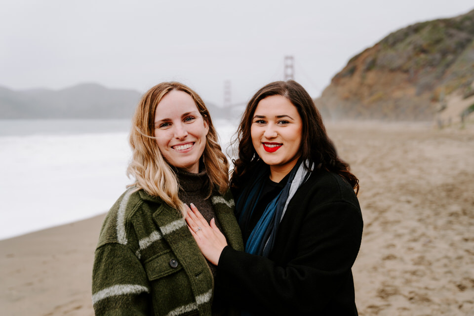 couple smiling after golden gate proposal