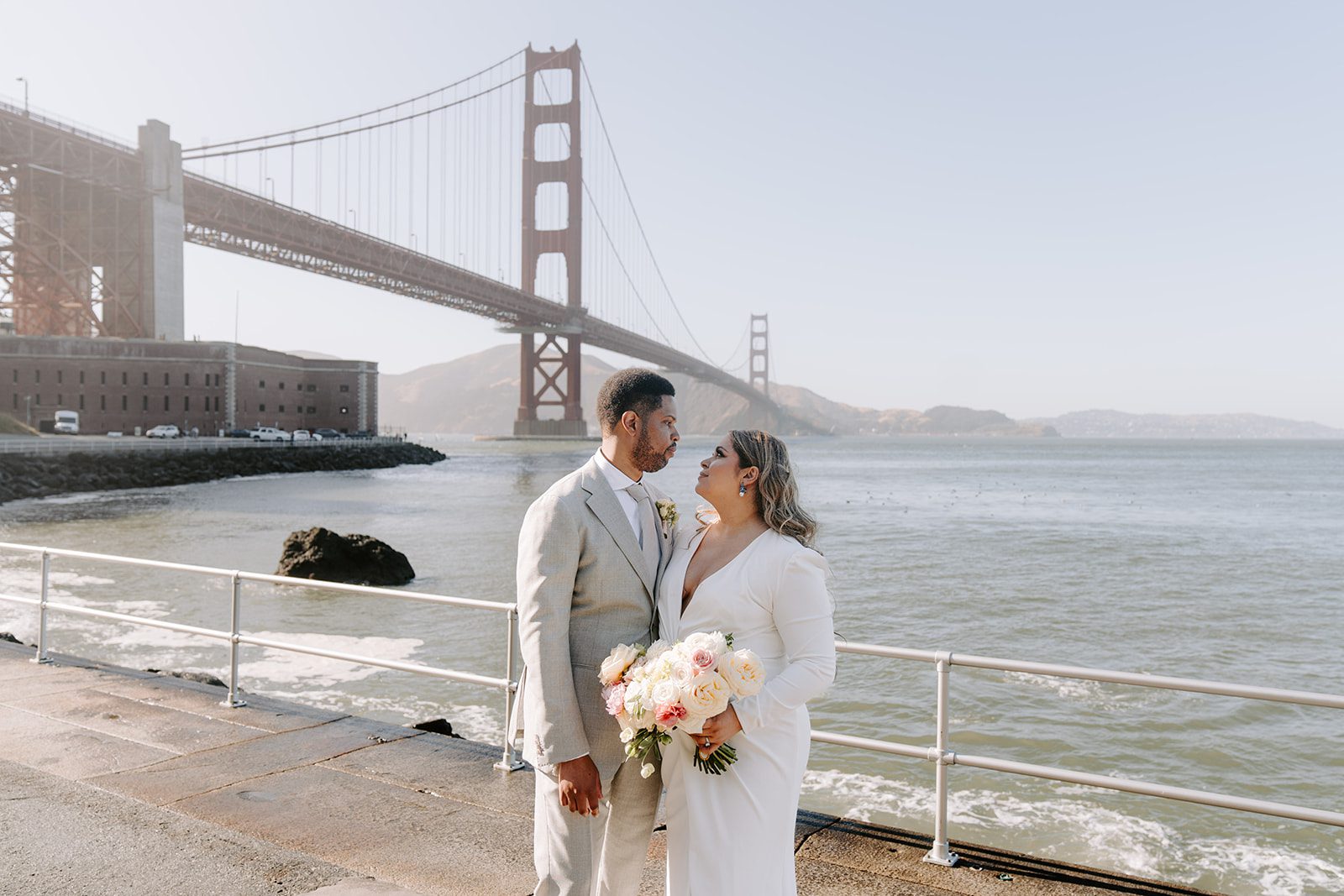 Bride and groom smiling during their Fort Point San Francisco elopement.